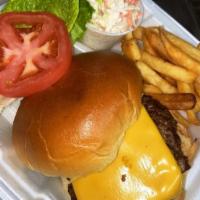 Angus Burger on a Roll · Served w/ fries & coleslaw. Topped w/ lettuce & tomato
