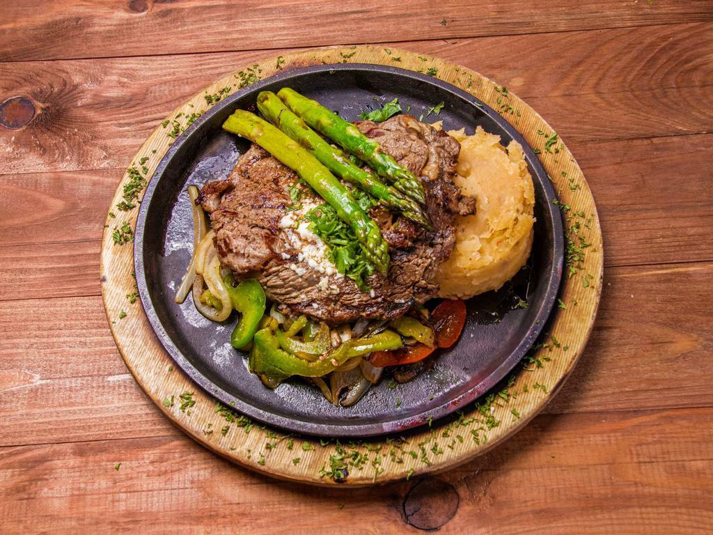 Steak Hacienda · Farmer's market veggies. 10 oz. grilled center cut ribeye. Served with chipotle mashed potatoes, grilled vegetables and chipotle butter.