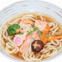 Seafood Udon · Shrimp, fish cake, crabmeat, mushroom, carrot, and scallion and broccoli.