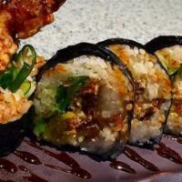 Amazing Roll · Soft shell crab inside, salmon, avocado on the top with eel sauce and masago.