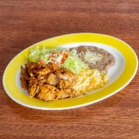 Carnitas Dinner · Delicious pieces of fried pork served with rice, beans refried or black, lettuce, tomatoes, ...