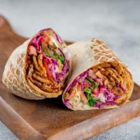 Grand Doner Wrap · Your choice of meat, lettuce, red cabbage, tomato, onions, and 3 signature sauces all wrappe...