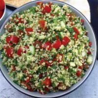 Quinoa Tabouli · Fresh Parsley with Quinoa, Tomato, and a blend of Olive oil & Lemon dressing