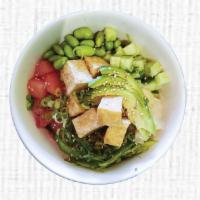 Vegie Bowl · Tofu, cucumber, edamame, tomato, avocado, seaweed salad, yakisoba sauce top with ginger, sca...