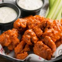 Boneless Wings · Tossed in sauce of your choice & served with choice of dressing
