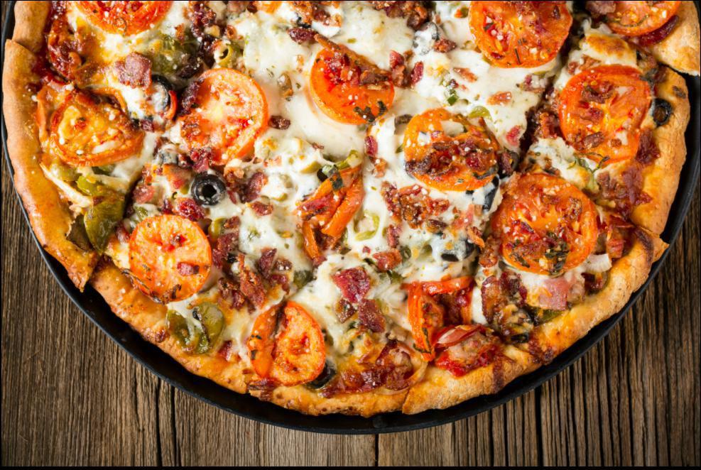 Rosati's Monster Pizza · Gourmet Italian sausage, meatball, pepperoni, Canadian bacon, onion, black and green olives, mushroom and green pepper with tomato and bacon on top of a thin crust with a rolled edge.