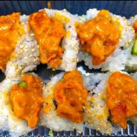Rose Maki · Crab, Avacado, Cucumber, Mayo, Spicy Sauce and Spicy Ahi with Sesame Seeds