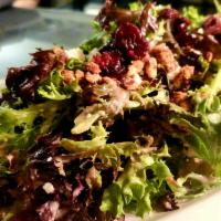 Gluten Free Pecan Gorgonzola Salad · Spring greens tossed with candied pecans, gorgonzola, dried cranberries and pecan vinaigrette.