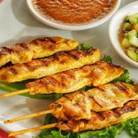 Chicken Satay · 5 pieces. Marinated chicken served with peanut sauce and cucumber salad.