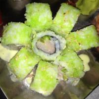Wasabi Maki · Hamachi and grilled asparagus rolled in wasabi, tobiko and wasabi mayo. 