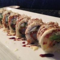 White Dragon Maki · Shrimp tempura, avocado, cream cheese, scallion, spicy sauce, wasabi mayo, eel sauce and tem...