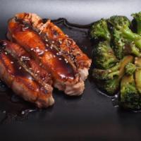 Teriyaki Salmon · Broccoli, onion with homemade teriyaki sauce. Served with rice.