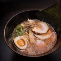 Spicy Tonkotsu Ramen · Pork bone soup, egg noodle ,topping with graund pork, soft boiled egg , scallions , sesame ,...