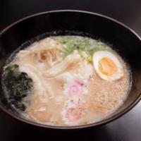 Seafood Ramen · egg noodle , topping with Scallop, shrimp, calamari, soft boiled egg , scallions , sesame , ...