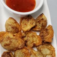Mini wonton poppers chicken  (10) · Fried mini wonton poppers with chicken (10 pcs)