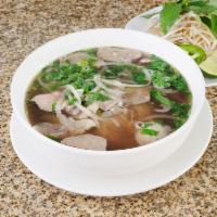 1c. Pho Dac Biet (combination) · Beef noodle soup combination with round steak, flank, brisket, tendon, tripe and meatballs.