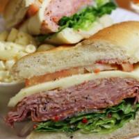 Italian Hero · Ham cappicola, salami,pepperoni, provolone, lettuce, tomato, onion and Italian dressing on a...