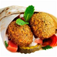 Falafel Sandwich · falafel on pita bred with salad and your choice of sauce 