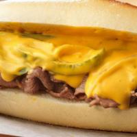 Philly Cheesesteak · Sirloin steak meat, cheddar cheese sauce, with green peppers, mushrooms, and onions .