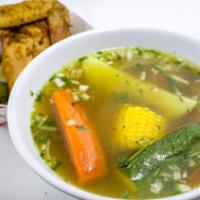 Sopa de Gallina · Chicken soup, Carrot, Potato, squash, cilantro/onion with jalapeño and tortillas 