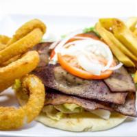 Gyro Platter · Lamb, lettuce, tomato, onion, tzatziki sauce with fries and onion rings.