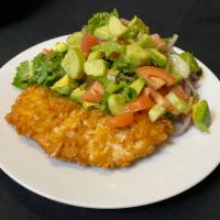 Chicken Milanesa · pan fried breaded chicken breast served with a chopped avocado salad