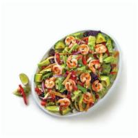 Grilled Shrimp Chile Lime Salad · Fresh salad greens and kale, pico, onion, bell pepper, jicama, and tortilla strips tossed wi...