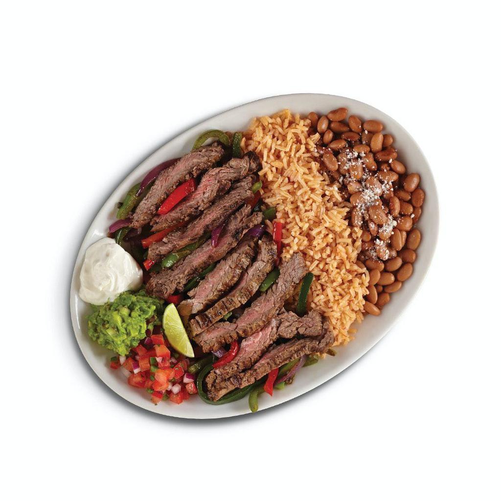 Fajitas · Grilled meat or seafood, roasted veggies, rice, your choice of black or pinto beans, sour cream, pico, and guacamole with warm tortillas.