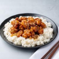 Sesame Chicken · Battered and fried chicken chunks with sesame flavor.