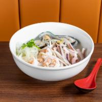 26. Rice Noodle Soup with Seafood · Shrimp, squid, mussels, and crab meat.