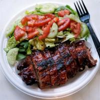 1/2 Baby Back Ribs Meal · Served with a side salad, pita bread and your choice of one hot side order.