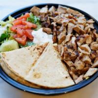 Chicken Shawarma Platter · served with rice or French fries, green salad, and pita bread. Tzatziki on the side. 