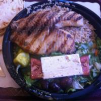 Grilled Tilapia · Served with rice, grilled vegetables, pita and salad. 