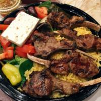Lamb Chops · Served with salad, pita and a choice of a hot side order. 