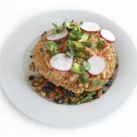 Vegan Organic Tofu Tostada · Crispy tortilla, tofu, black beans, red radishes, red bell peppers, avocado, pico de gallo, ...