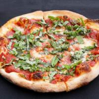 Red Karla Pizza · Fresh mozzarella, san marzano tomatoes, cut garlic, olive oil and fresh basil. Hand tossed d...