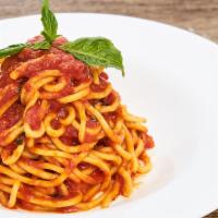 Spaghetti · San Marzano tomato sauce.