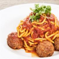 Spaghetti con Polpette · Meatballs, tomato sauce and pecorino.