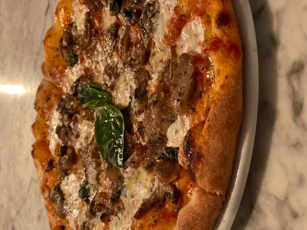 Pizza Funghi Misti · Porcini, oyster, shitake, oyster, and white mushrooms with mozzarella, tomato sauce.