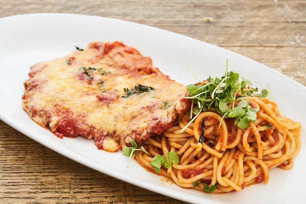 Chicken Parmigiana · Served with spaghetti pomodoro.