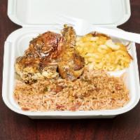 Small Jerk Chicken · Includes rice and peas or white rice and choice of 1 side.