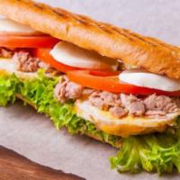 Tuna Sandwich  · Flaked tuna mixed with mayo on our fresh 10” hero.
Add your choice of cheese , toppings n sa...