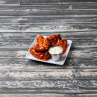 Buffalo Wings · Steamed then baked chicken wings, served with our house sour cream capers-based dip. Served ...