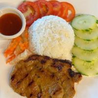 Vietnamese pork chops · Rice,BBQ pork,cucumber,tomato,pickle carrot,calamari sauce