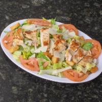Caesar Salad · Romaine lettuce, tomatoes, croutons, Parmesan cheese and Caesar dressing. Add chicken for an...