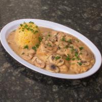 Chicken Marsala · Sauteed boneless chicken with mushroom and Marsala sauce, served with choice of rice or mash...