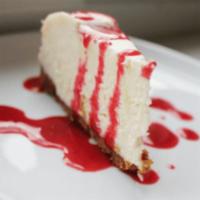 NEW YORK CHEESECAKE · Classic New York Cheesecake with Raspberry sauce