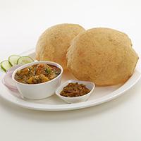Aloo Subji with Puri · Deep fried whole wheat bread served with potato gravy.