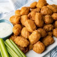 Party Platter Boneless Wings · 2 lbs of spicy Buffalo, cherry cola BBQ or sweet chili boneless wings with celery & bleu che...