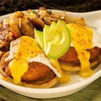 Crab Cake Benedict · 2 poached eggs over our tender crab cakes on an English muffin with our hollandaise sauce an...